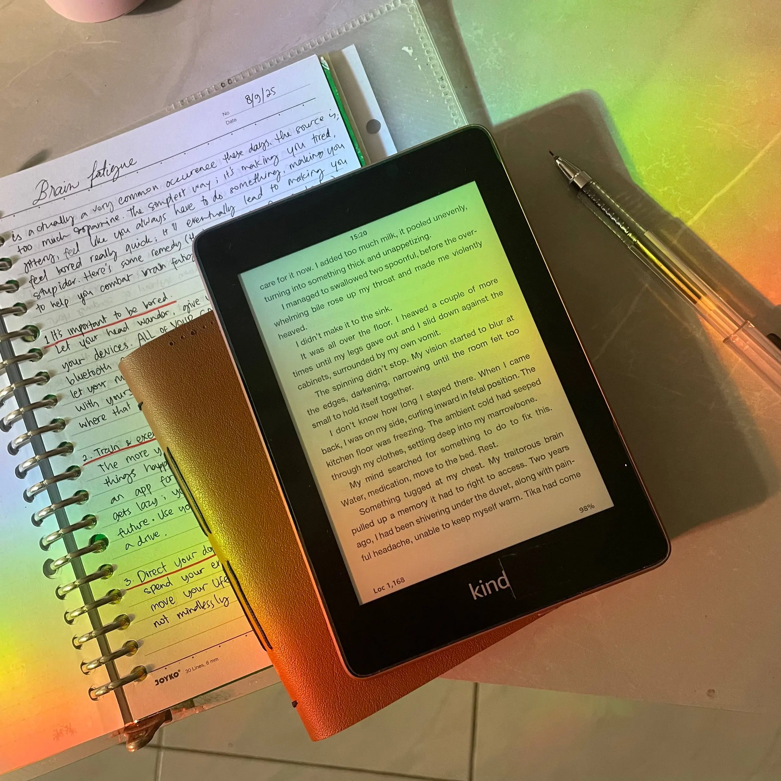 An e-reader resting on a cozy blanket